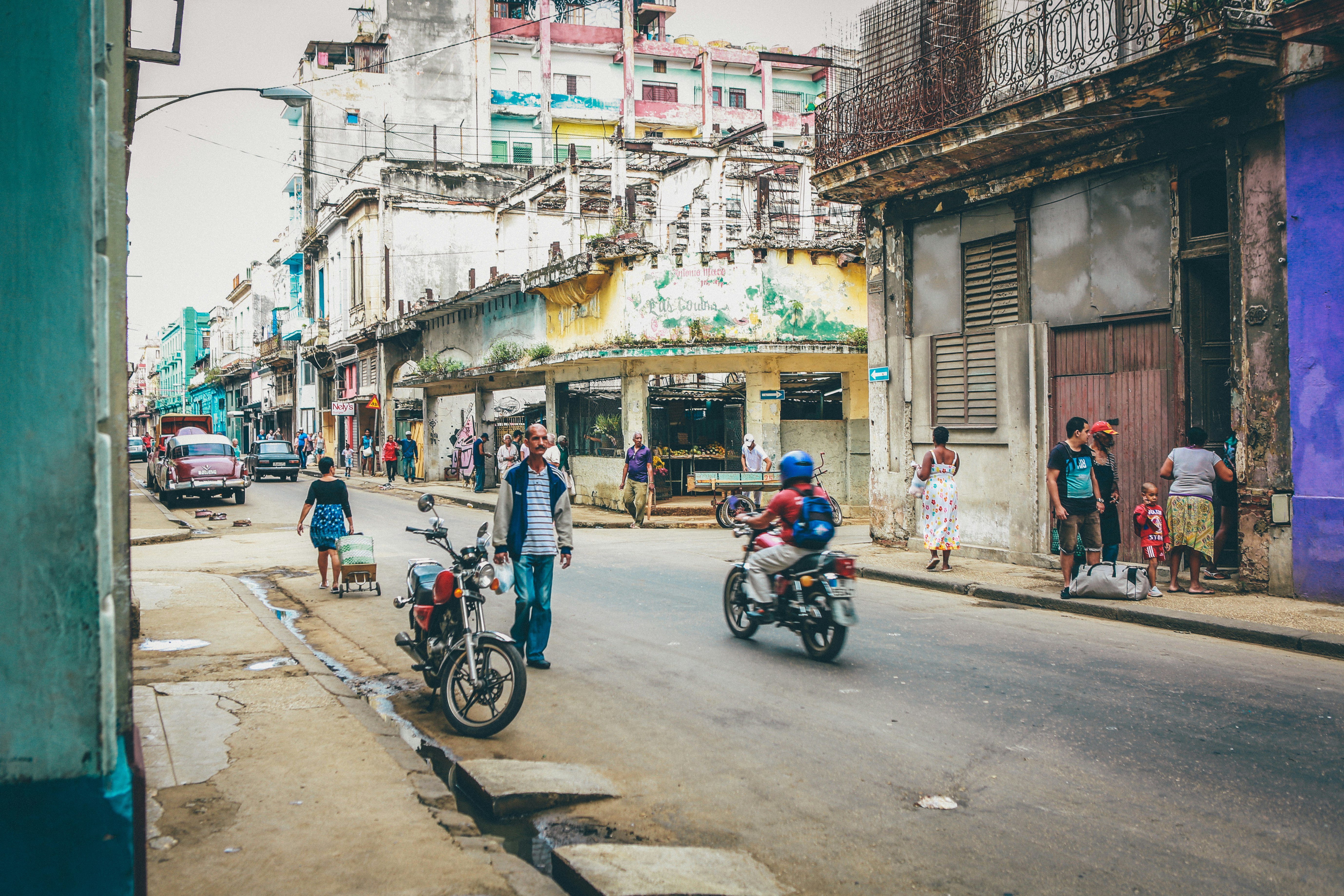 man walking on road